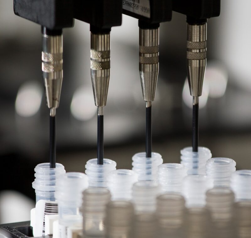 a group of plastic cups sitting on top of a machine